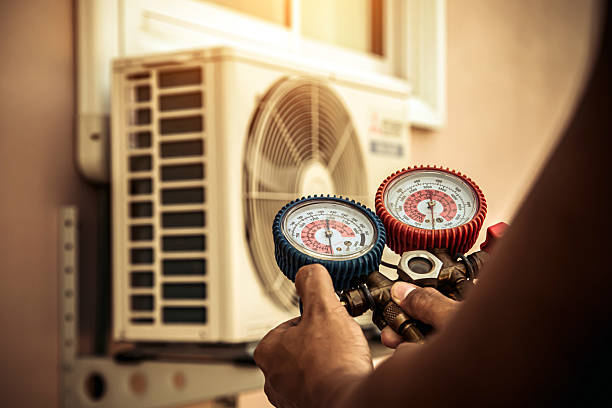 Professional Ductwork Repair technician working in Logan, AL